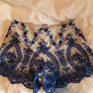 White and Blue zip up shorts